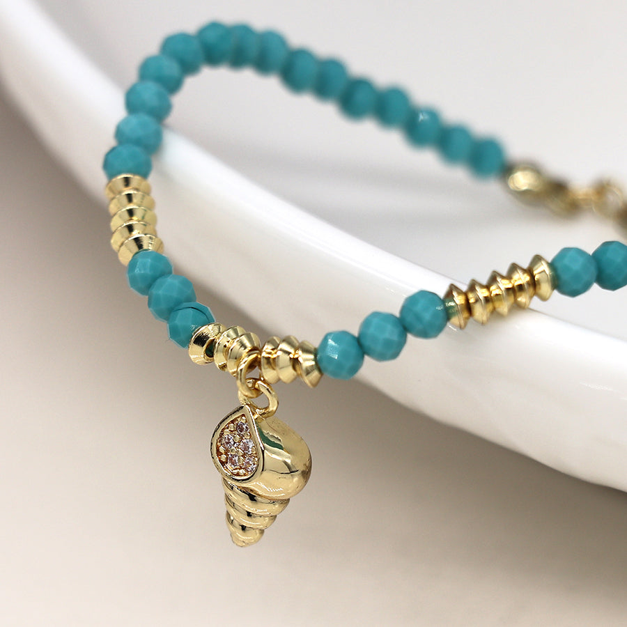 4416 - Golden Shell Charm & Turquoise Bead Bracelet