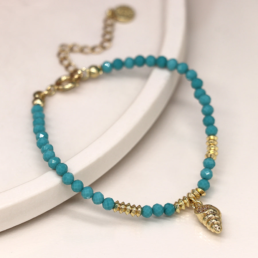4416 - Golden Shell Charm & Turquoise Bead Bracelet